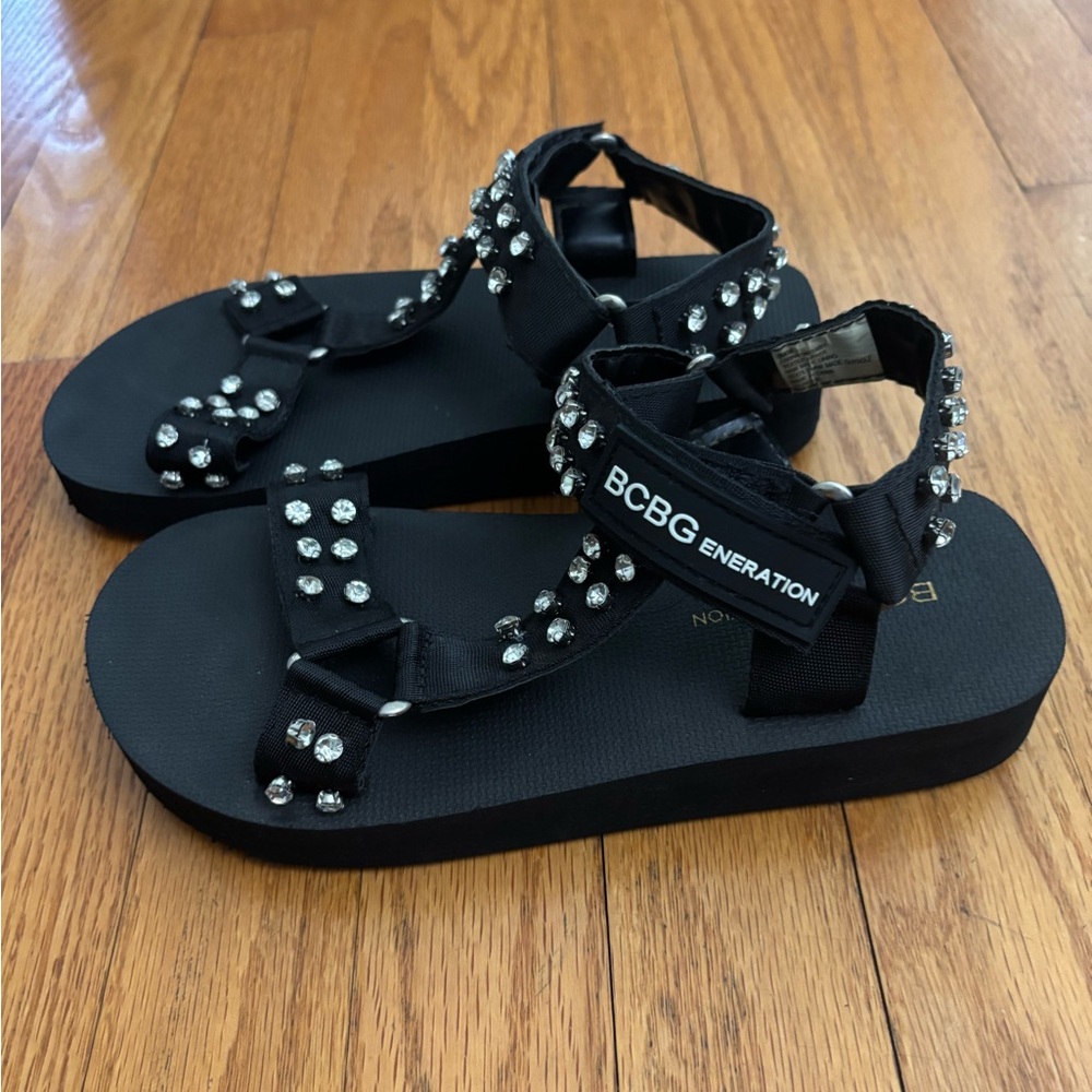 BCBGeneration Sandals Women’s 6M Black Parna Ankle Strap Shoe *Flaw Shown